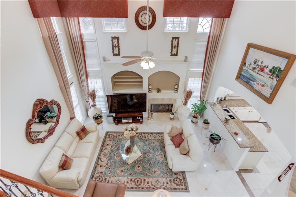 2648 Stockbridge Way Dacula, GA 30019 - Photo 25 of 59 a view of living room with furniture and a fireplace