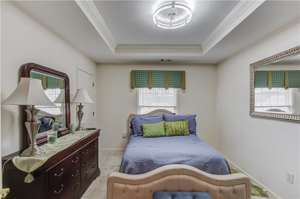 2648 Stockbridge Way Dacula, GA 30019 - Photo 42 of 59 a living room with furniture