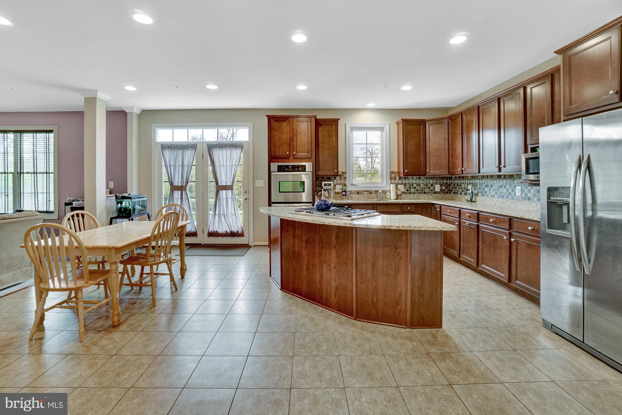 20220 McNamara Road Poolesville, MD 20837 - Photo 18 of 61 LARGE and inviting kitchen