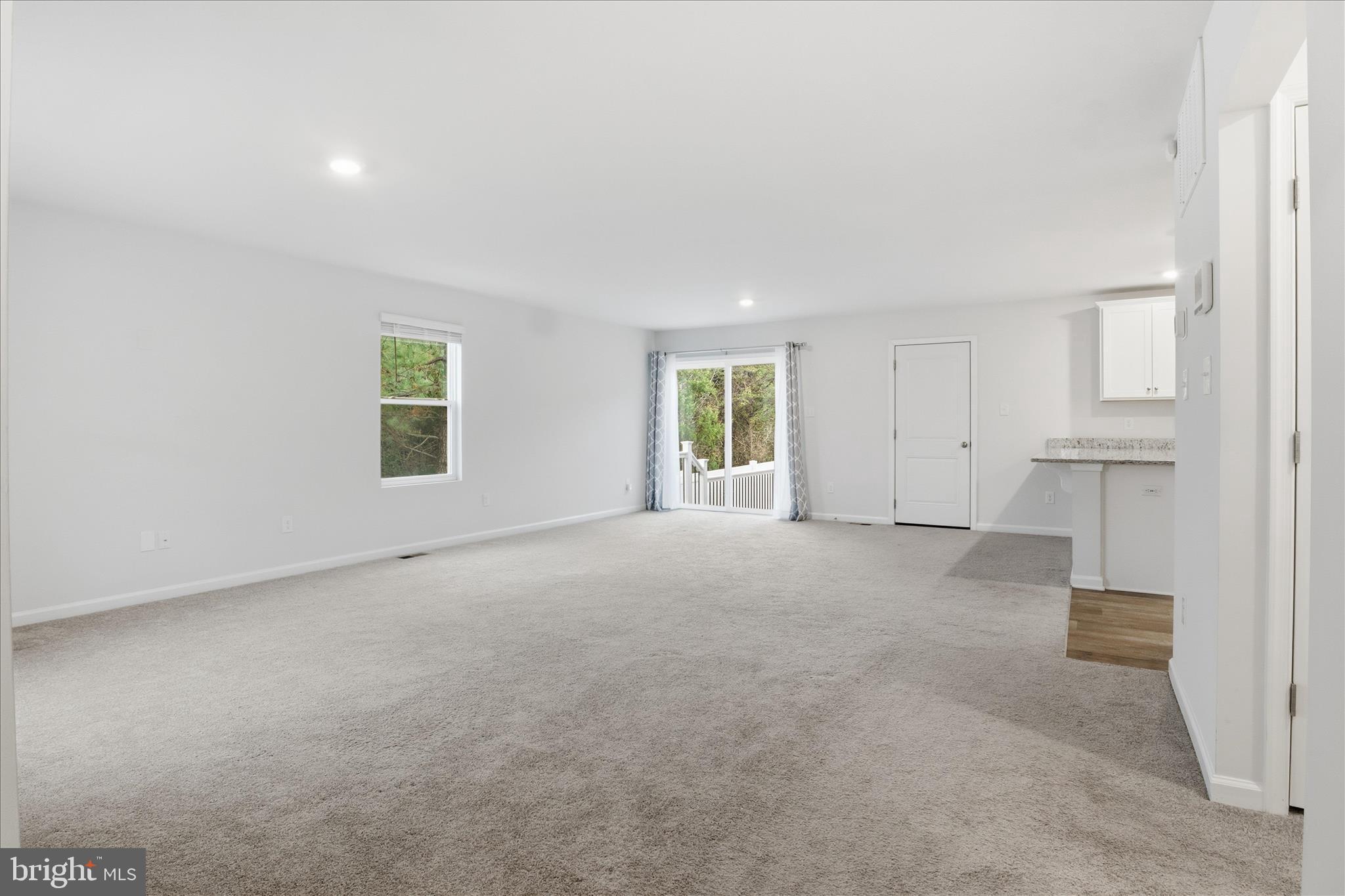 6619 Sacagawea Street Ruther Glen, VA 22546 - Photo 11 of 58 Living room/dining room combo