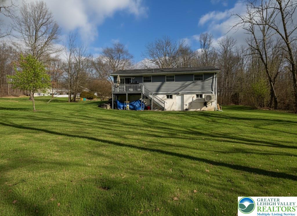 162 Independence Road East Stroudsburg, PA 18301 - Photo 7 of 24 a view of a house with a big yard