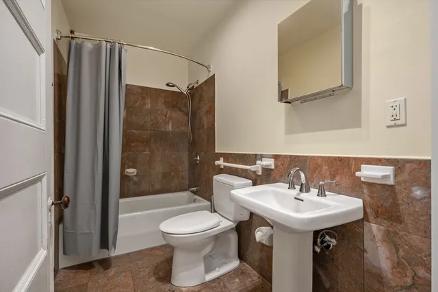 a bathroom with a sink and a toilet