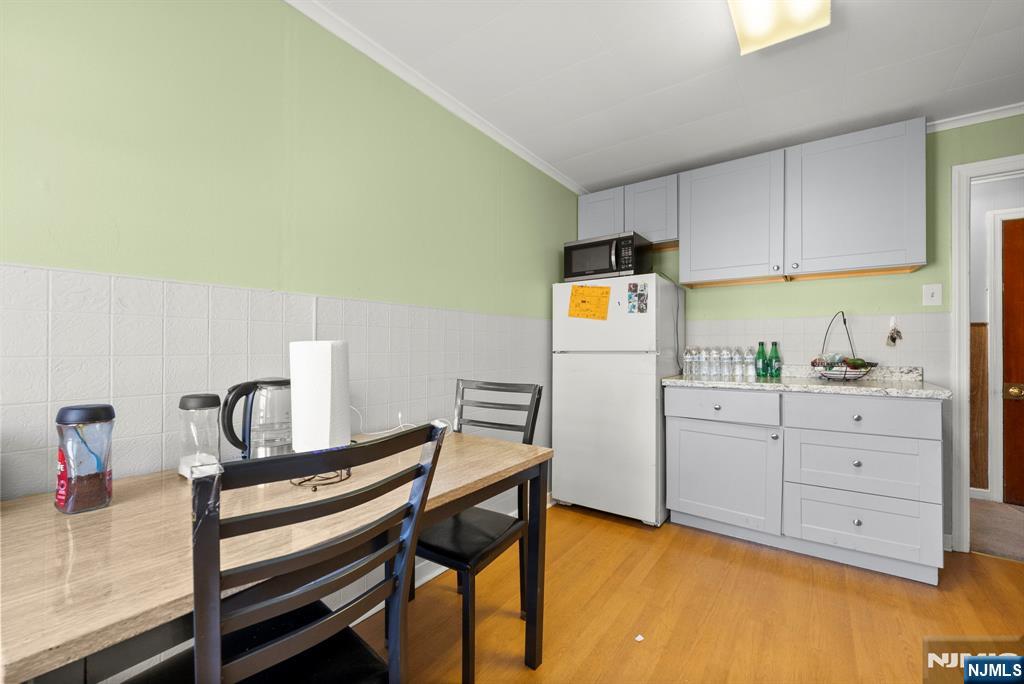 91 Headley Terrace Irvington, NJ 07111 - Photo 25 of 50 a room with storage and utility