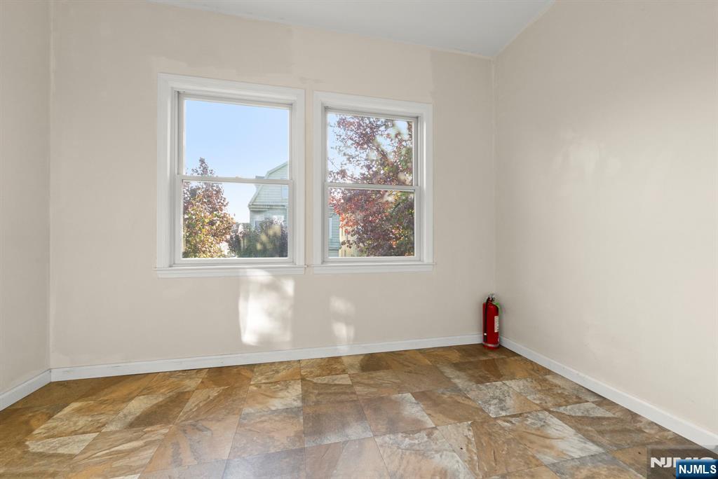 91 Headley Terrace Irvington, NJ 07111 - Photo 29 of 50 a view of empty room with window