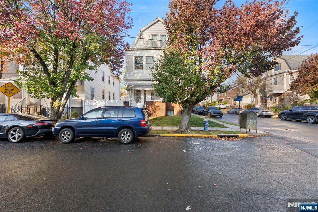 91 Headley Terrace Irvington, NJ 07111 - Photo 3 of 50 a view of street with parked cars