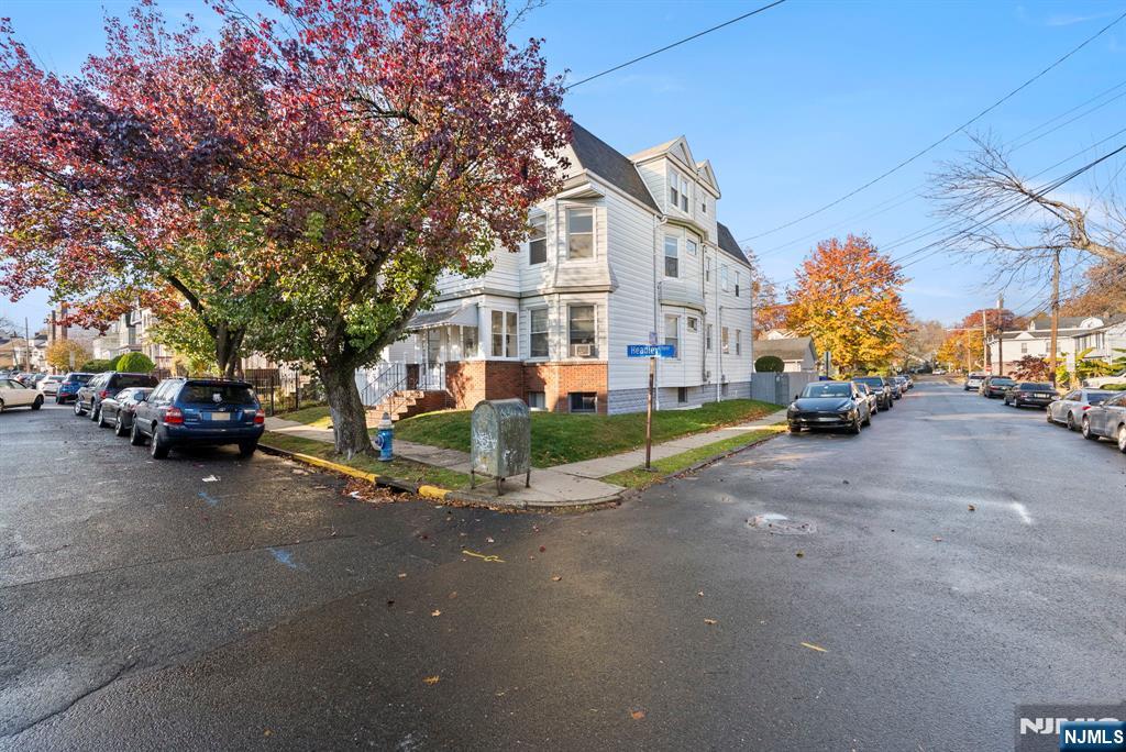 91 Headley Terrace Irvington, NJ 07111 - Photo 4 of 50 a view of a street with cars