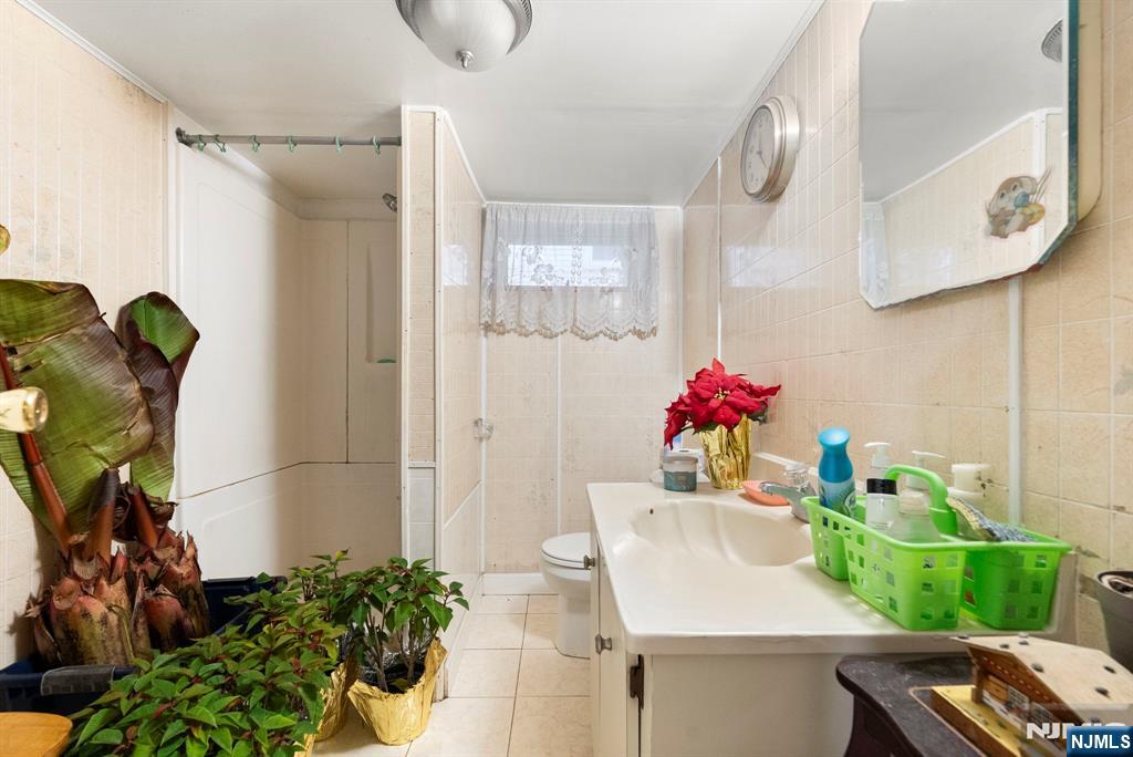 91 Headley Terrace Irvington, NJ 07111 - Photo 43 of 50 a view of a dining room with furniture