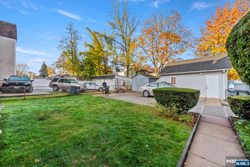 91 Headley Terrace Irvington, NJ 07111 - Photo 8 of 50 a view of a house with backyard sitting area and garden