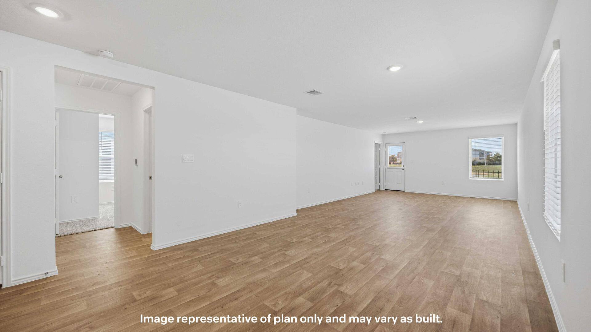 7441 10th Street Lubbock, TX 79416 - Photo 16 of 25 an empty room with wooden floor and windows