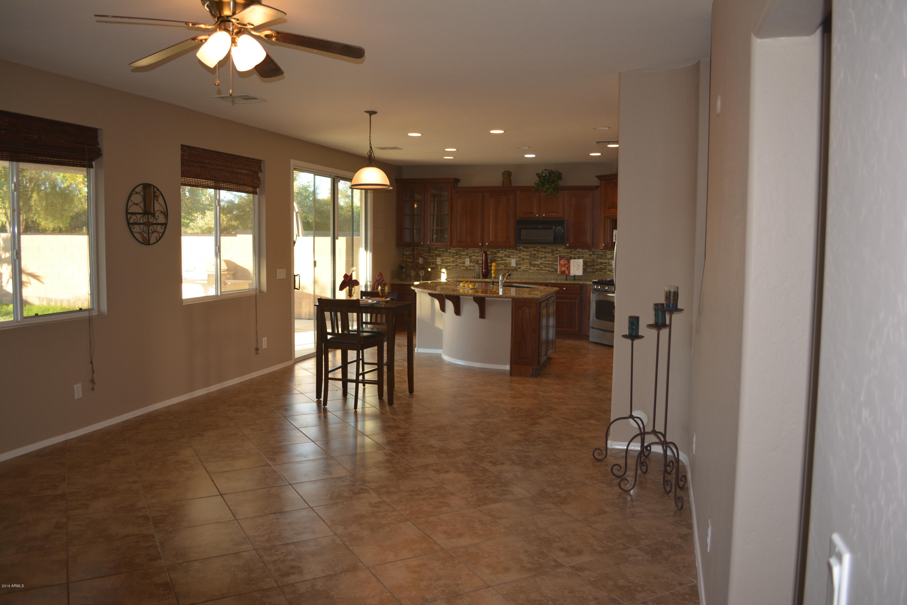 14983 West Wethersfield Road Surprise, AZ 85379 - Photo 16 of 43 Family room
