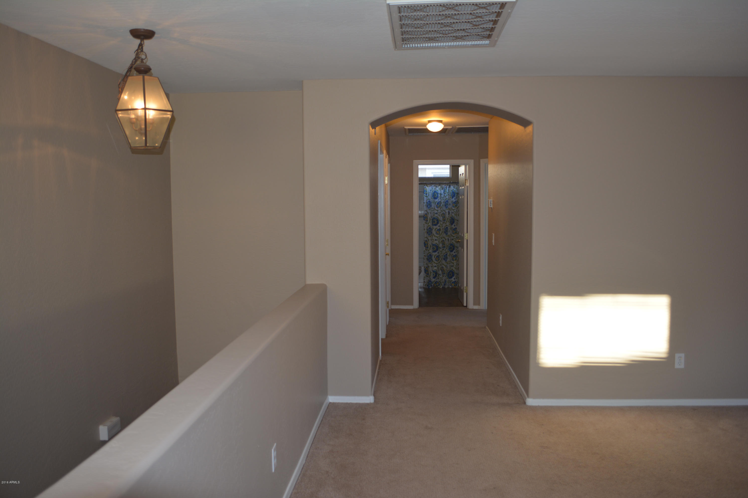 14983 West Wethersfield Road Surprise, AZ 85379 - Photo 20 of 43 Hallway off of loft