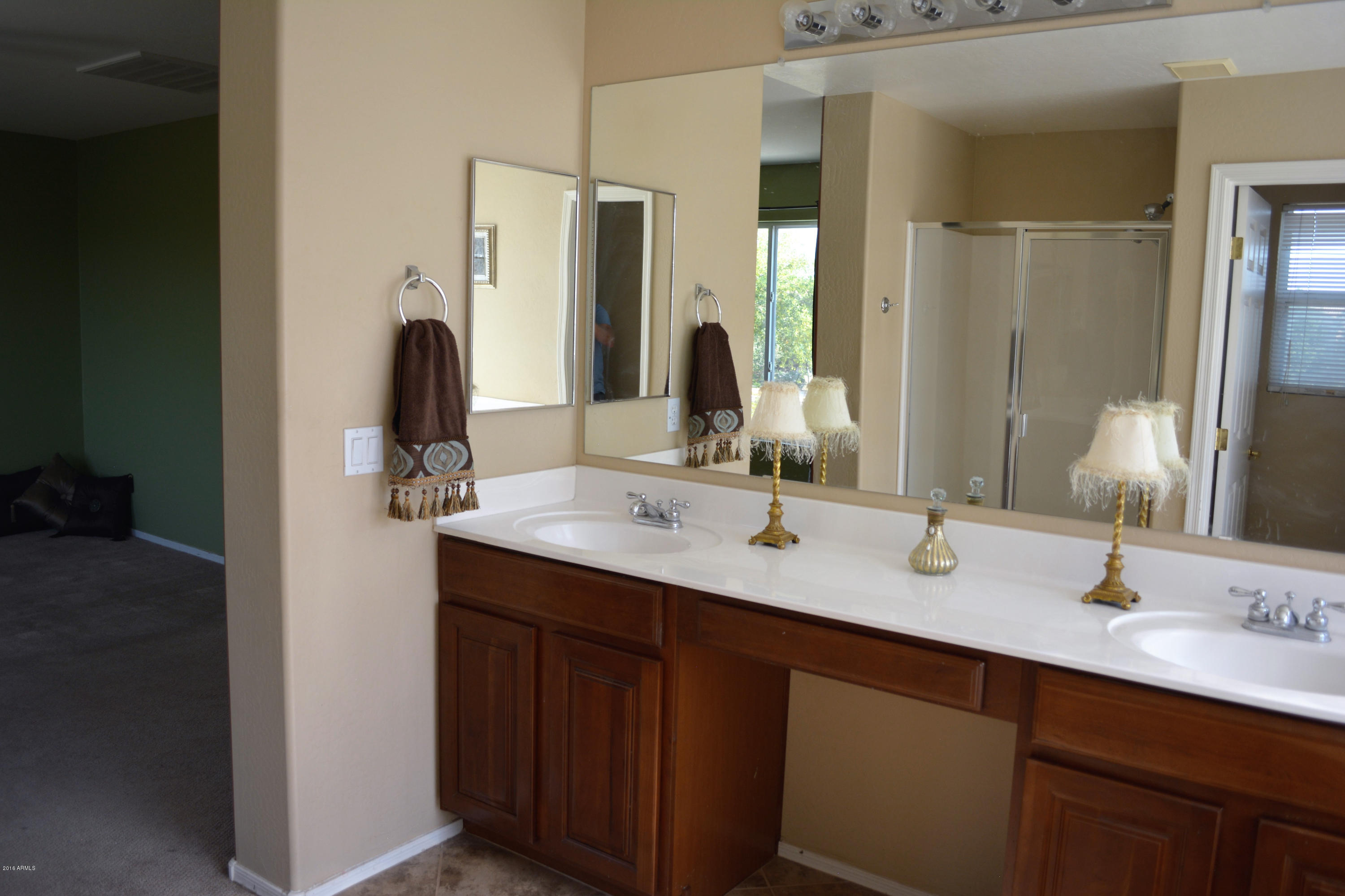 14983 West Wethersfield Road Surprise, AZ 85379 - Photo 25 of 43 Double sinks with vanity