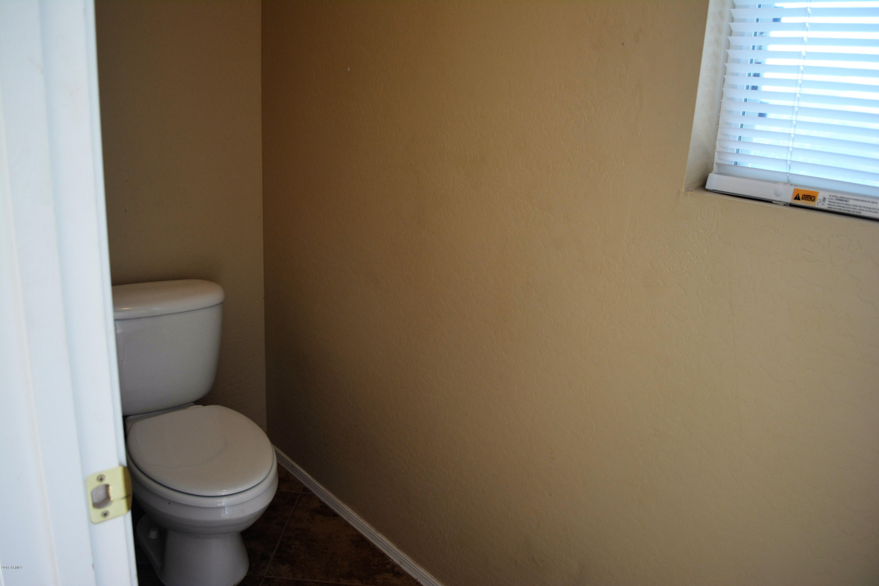 14983 West Wethersfield Road Surprise, AZ 85379 - Photo 27 of 43 Private Toilet room