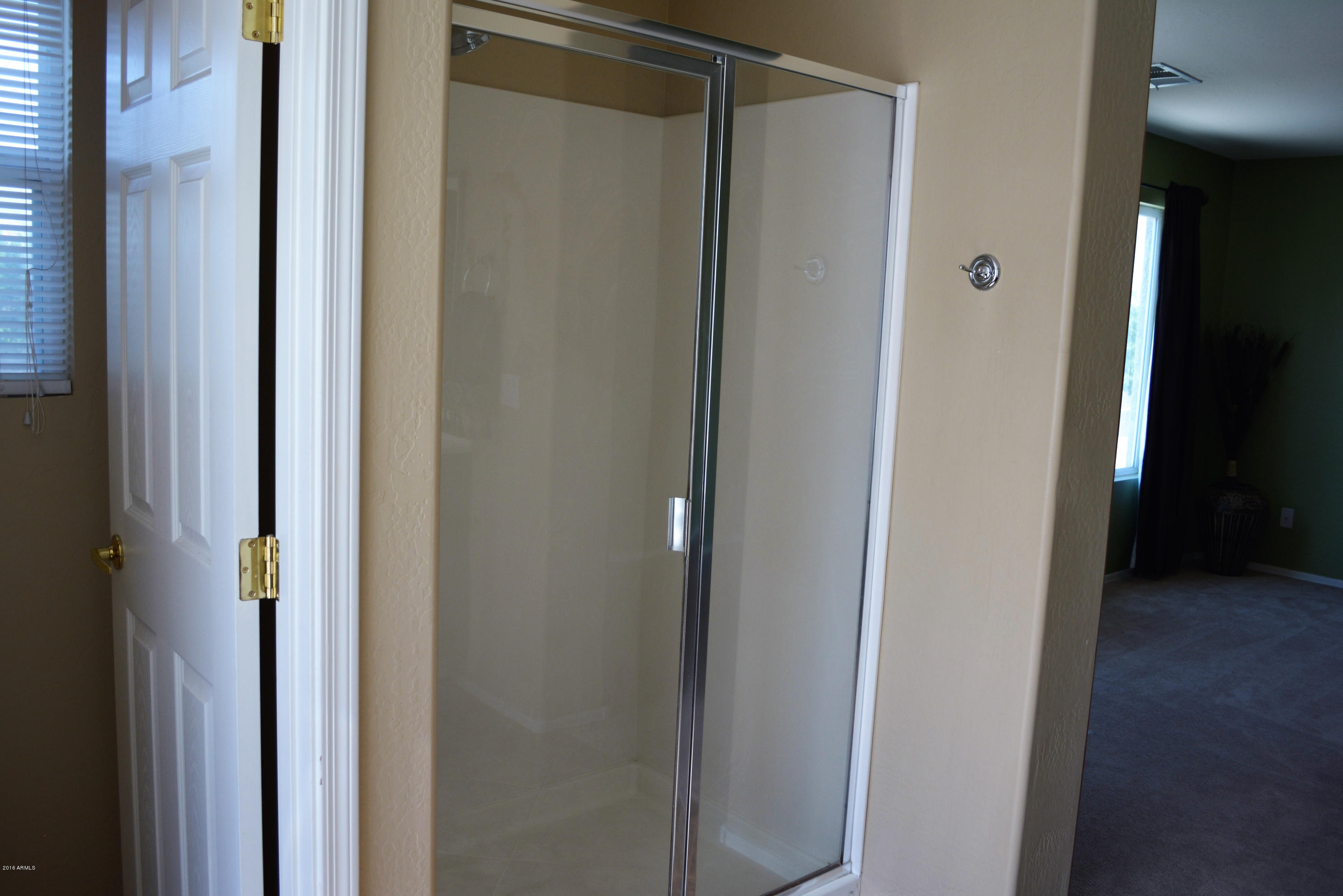 14983 West Wethersfield Road Surprise, AZ 85379 - Photo 28 of 43 Walk in shower