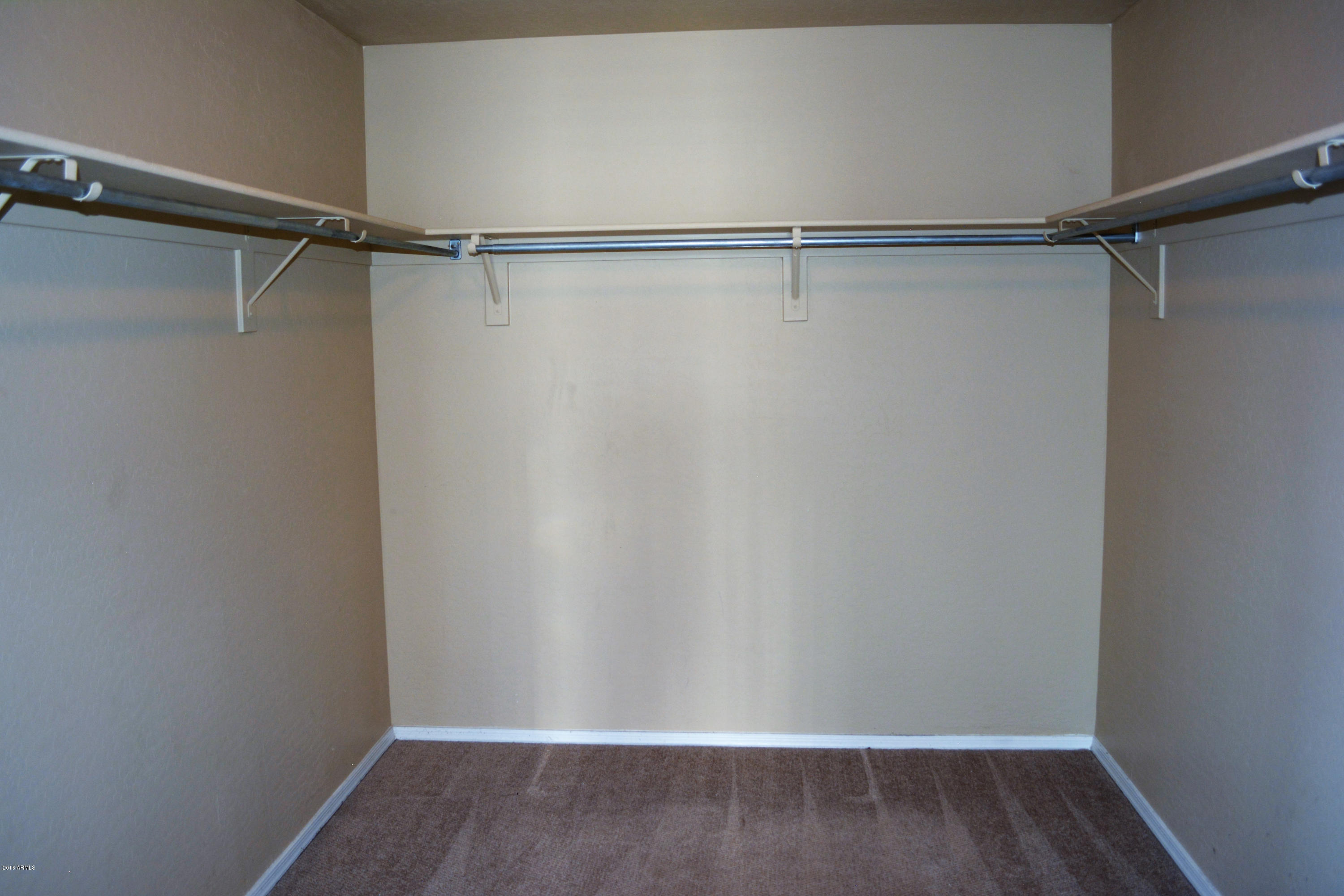 14983 West Wethersfield Road Surprise, AZ 85379 - Photo 29 of 43 Master Walk in closet