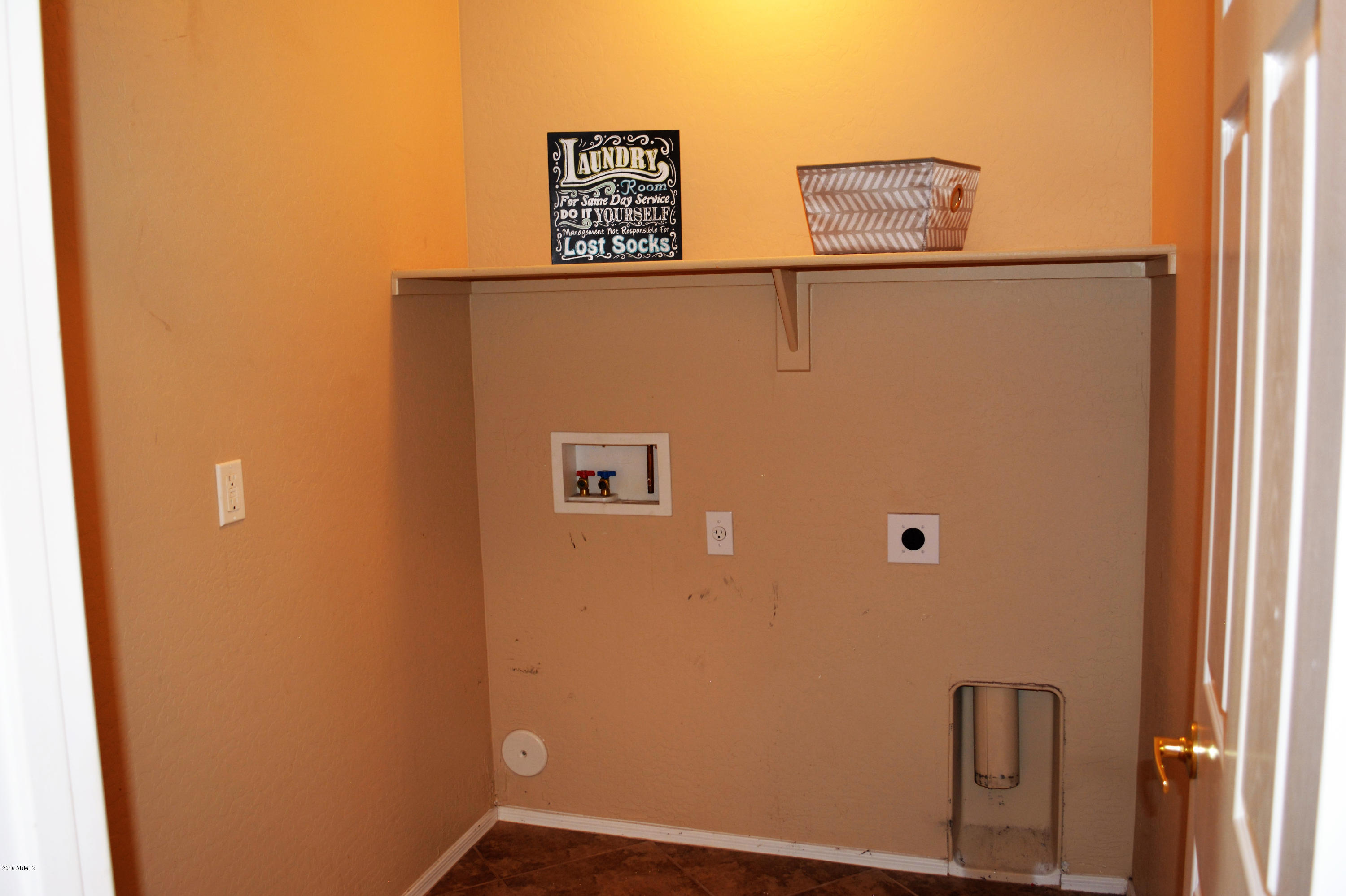 14983 West Wethersfield Road Surprise, AZ 85379 - Photo 35 of 43 Laundry room