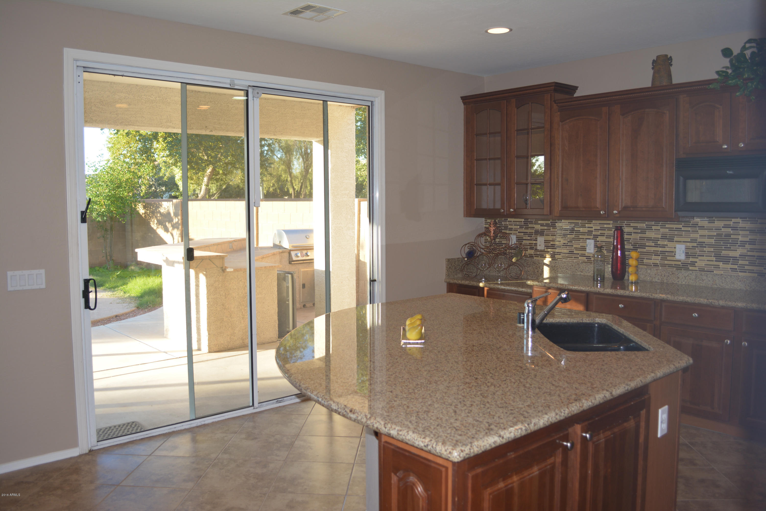 14983 West Wethersfield Road Surprise, AZ 85379 - Photo 9 of 43 Island kitchen