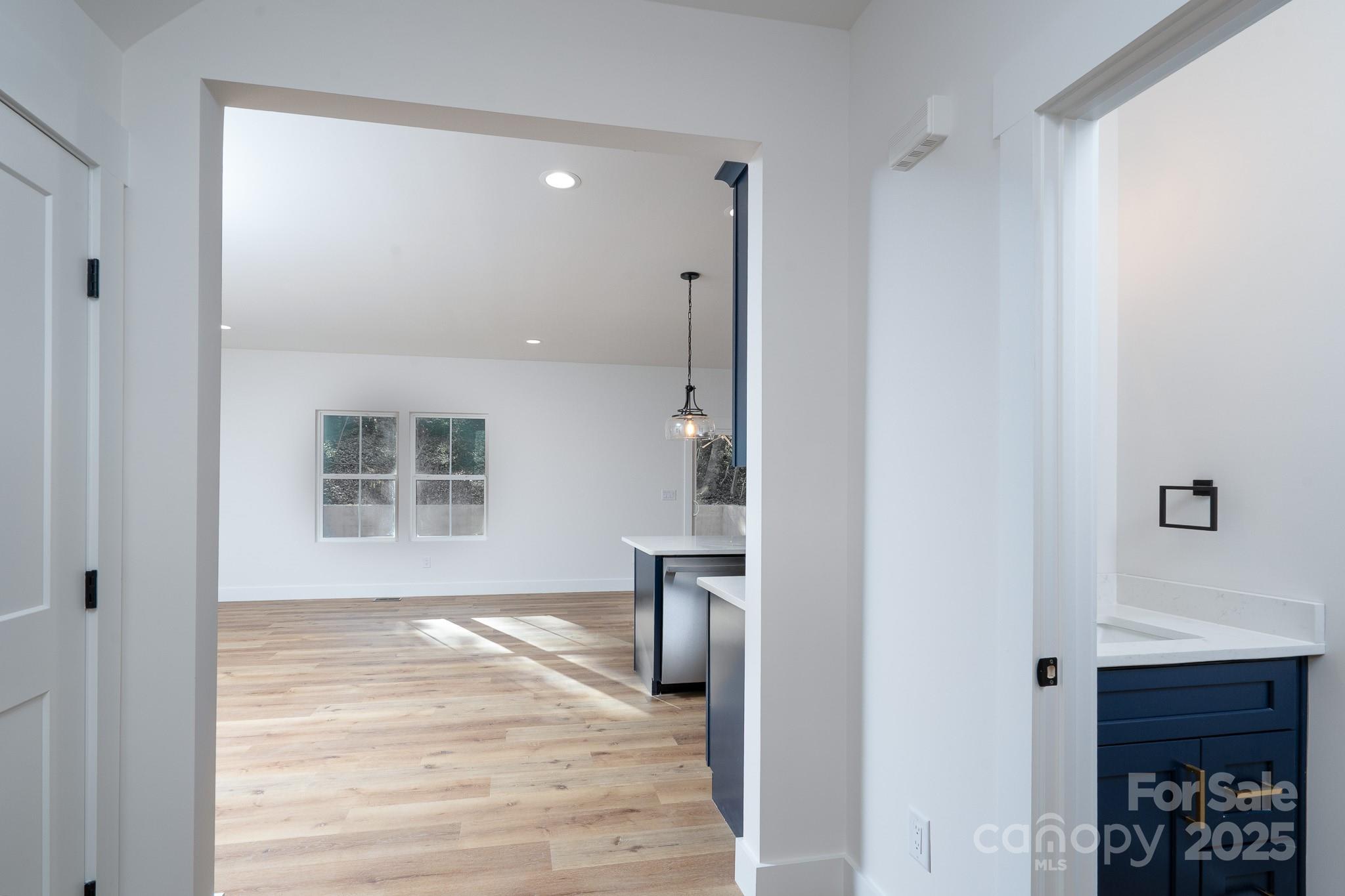 924 Oregon Street Kannapolis, NC 28083 - Photo 29 of 34 a view of empty room with wooden floor and a window