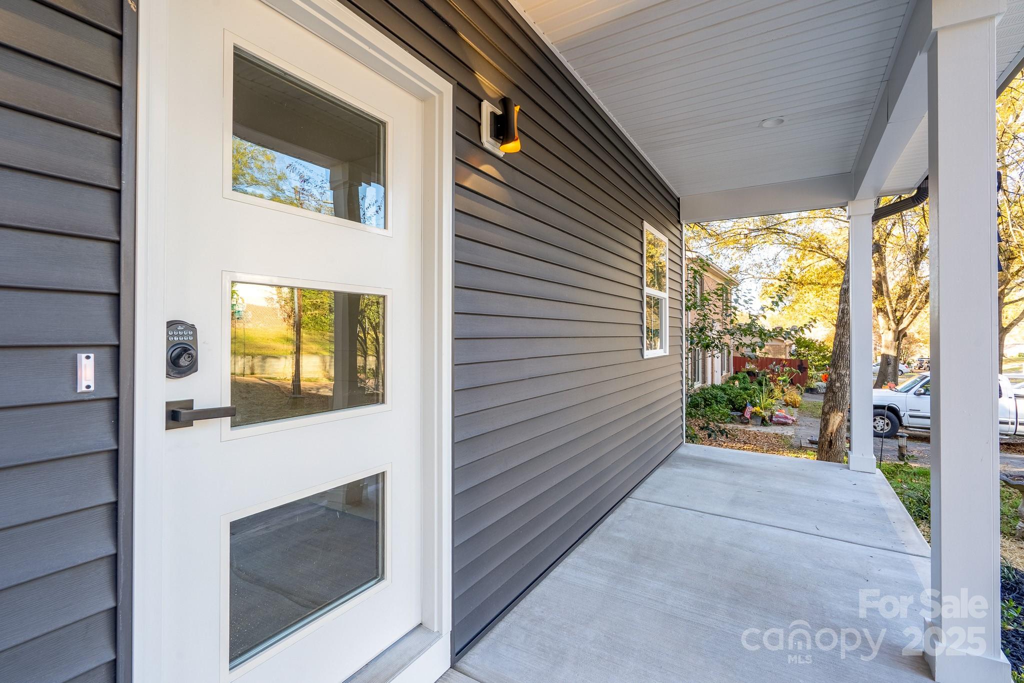 924 Oregon Street Kannapolis, NC 28083 - Photo 33 of 34 a view of a pathway along with potted plants