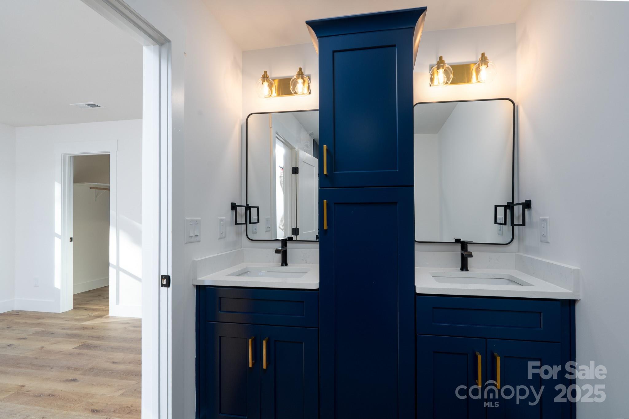 924 Oregon Street Kannapolis, NC 28083 - Photo 5 of 34 a bathroom with a sink and a mirror