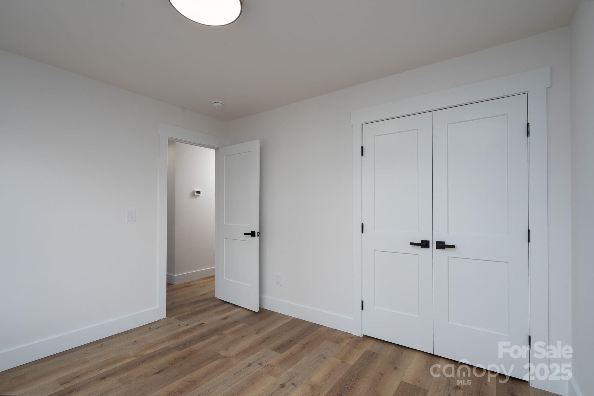 924 Oregon Street Kannapolis, NC 28083 - Photo 8 of 34 a view of a room with wooden floor