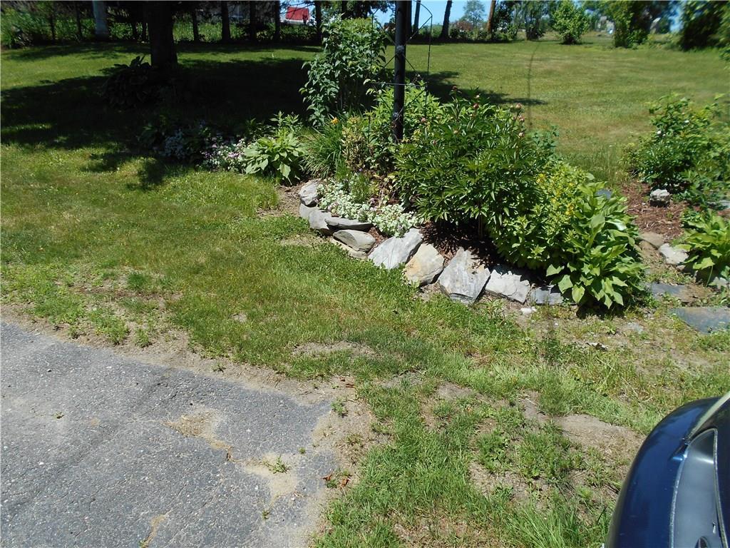 346 Knowlton Corner Road Farmington, ME 04938 - Photo 22 of 33 Rocked in flower bed.