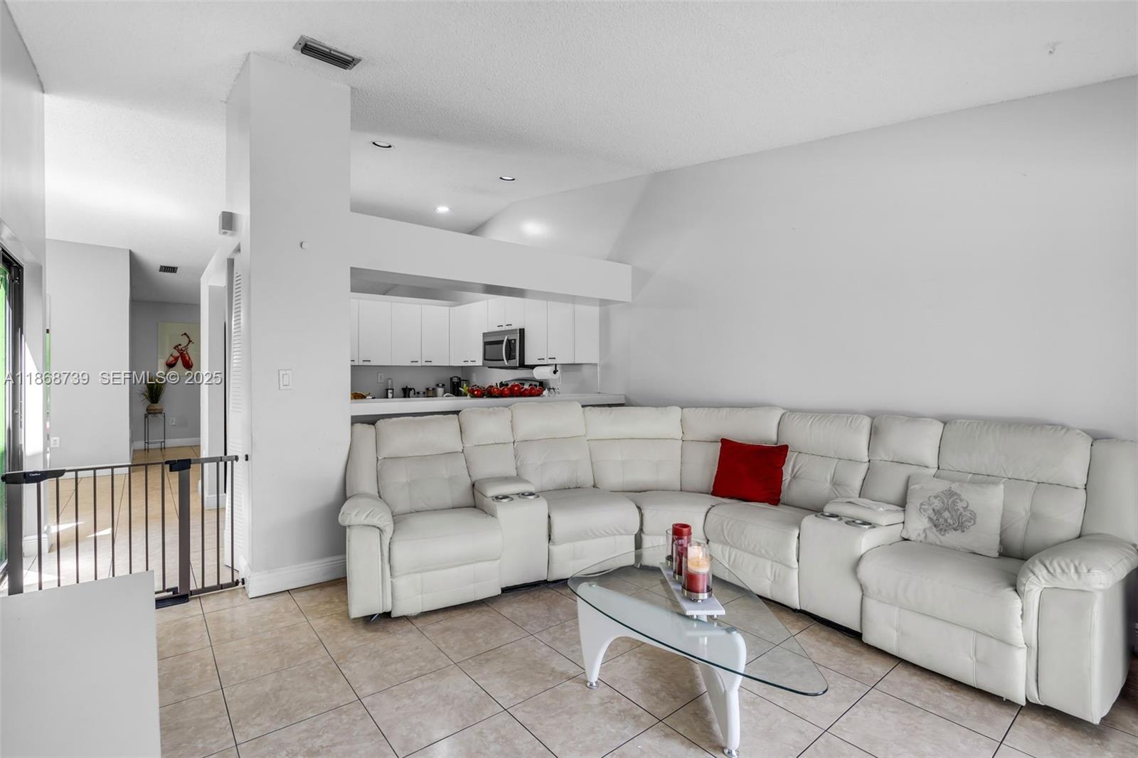 6646 Northwest 175th Terrace Hialeah, FL 33015 - Photo 11 of 33 a living room with furniture and a couch