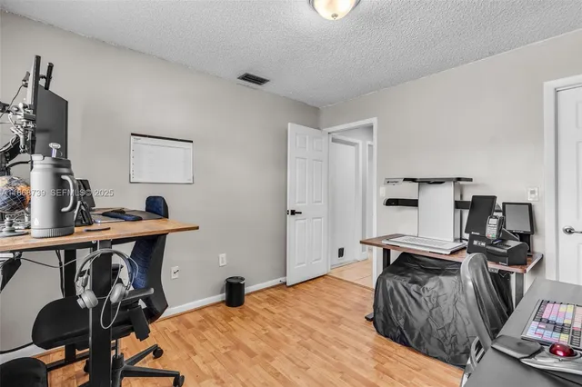 a bed room with a bed and furniture