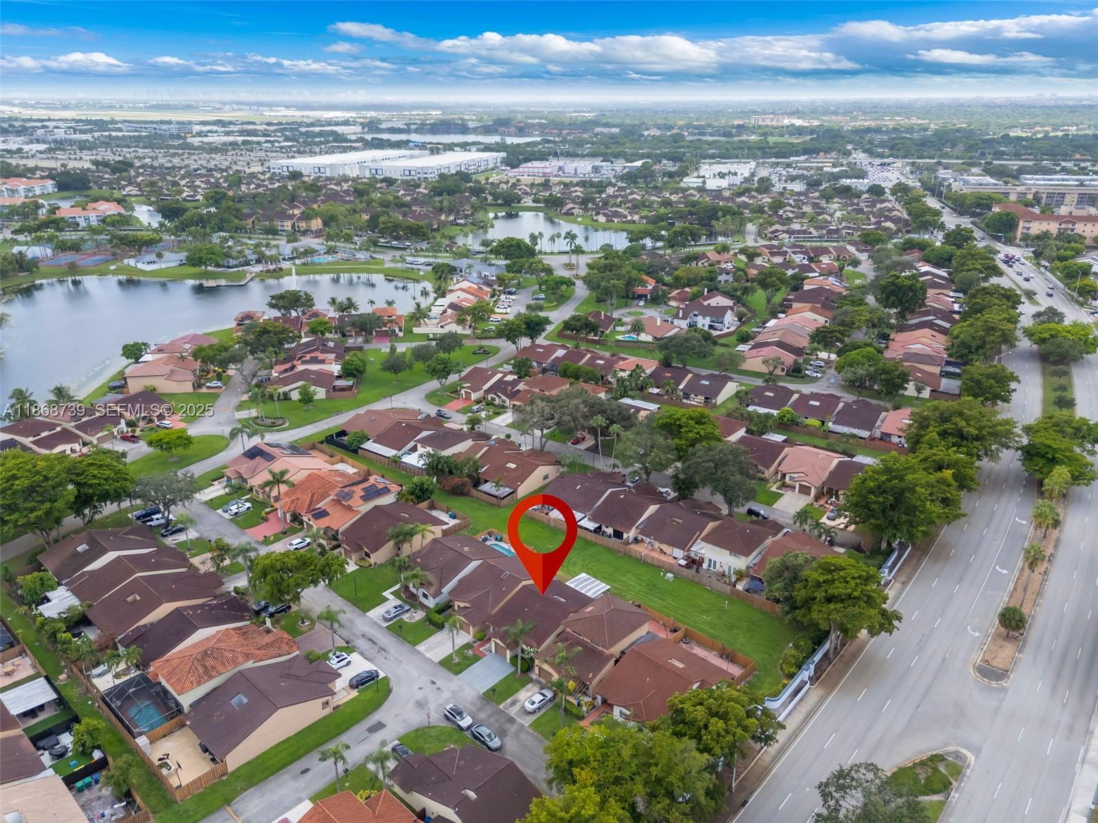 6646 Northwest 175th Terrace Hialeah, FL 33015 - Photo 24 of 33 an aerial view of residential building with outdoor space