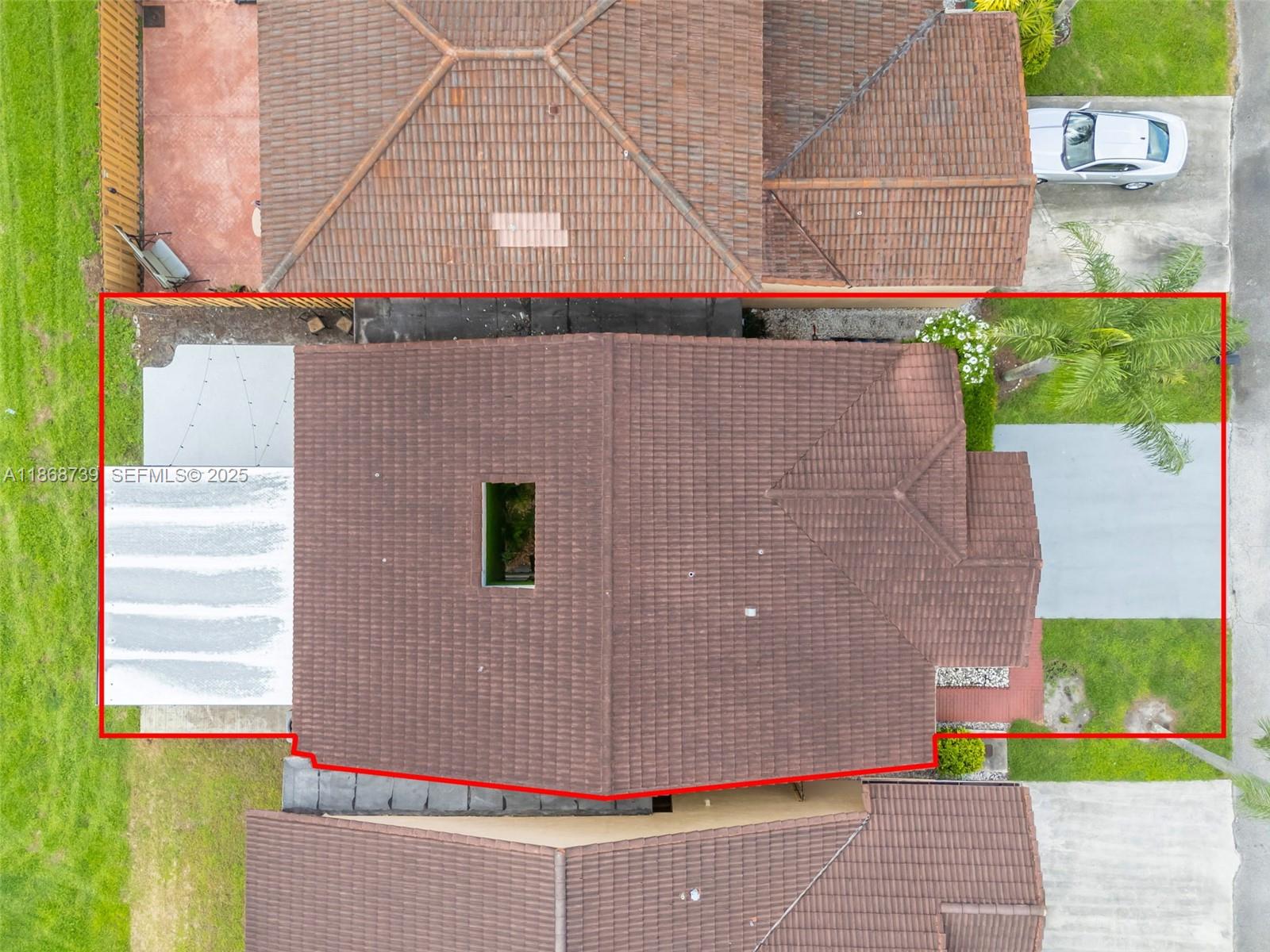 6646 Northwest 175th Terrace Hialeah, FL 33015 - Photo 25 of 33 a front view of a house with a yard