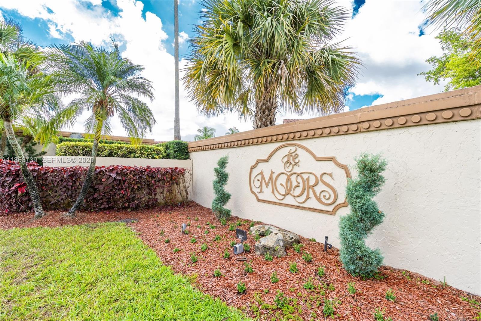 6646 Northwest 175th Terrace Hialeah, FL 33015 - Photo 26 of 33 a view of a street with a sign board