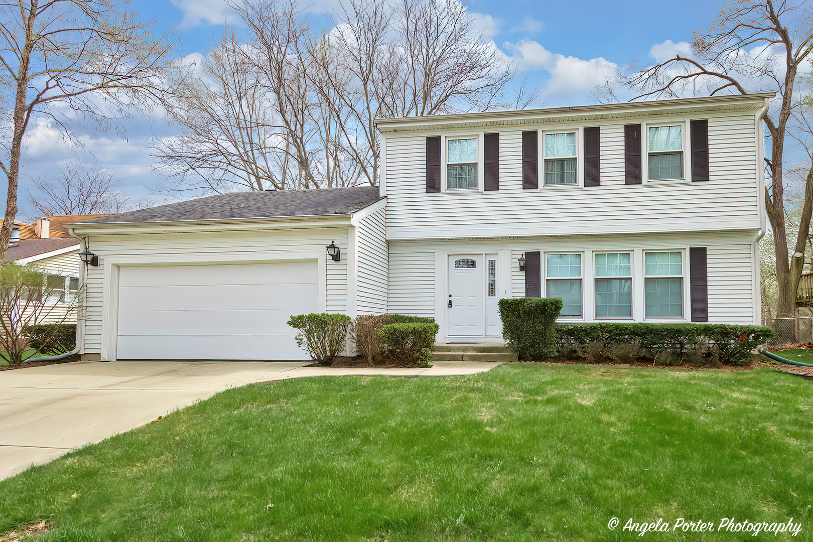 237 Annapolis Drive Vernon Hills, IL 60061 - Photo 1 of 28 a front view of a house with a yard and garage