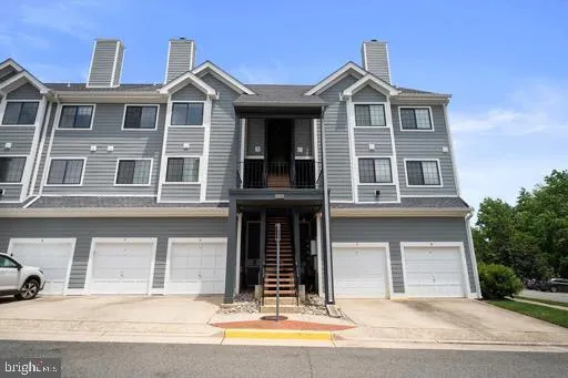 a front view of a house with yard