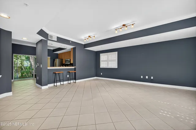 a view of a livingroom with a flat screen tv