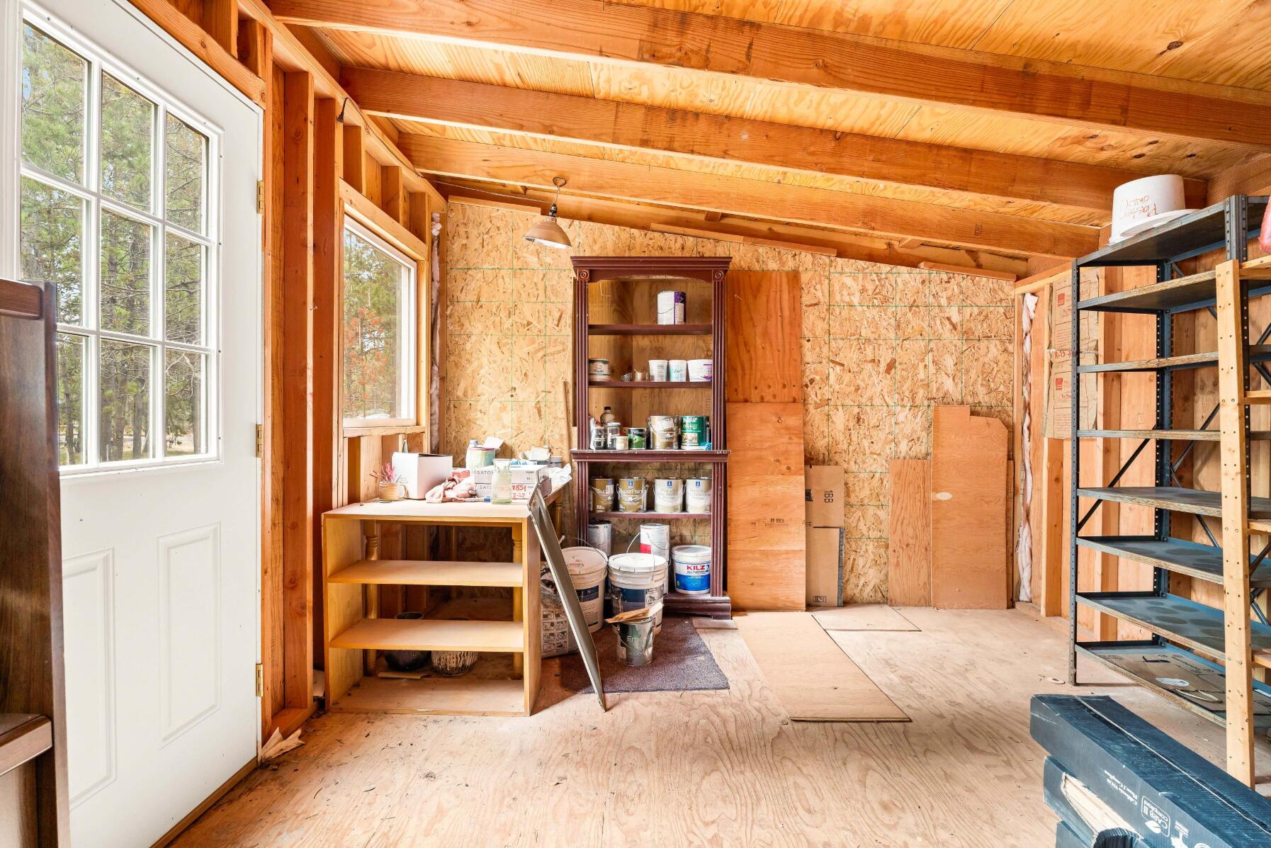 56244 Black Duck Road Bend, OR 97707 - Photo 15 of 24 a view of an empty room with a window
