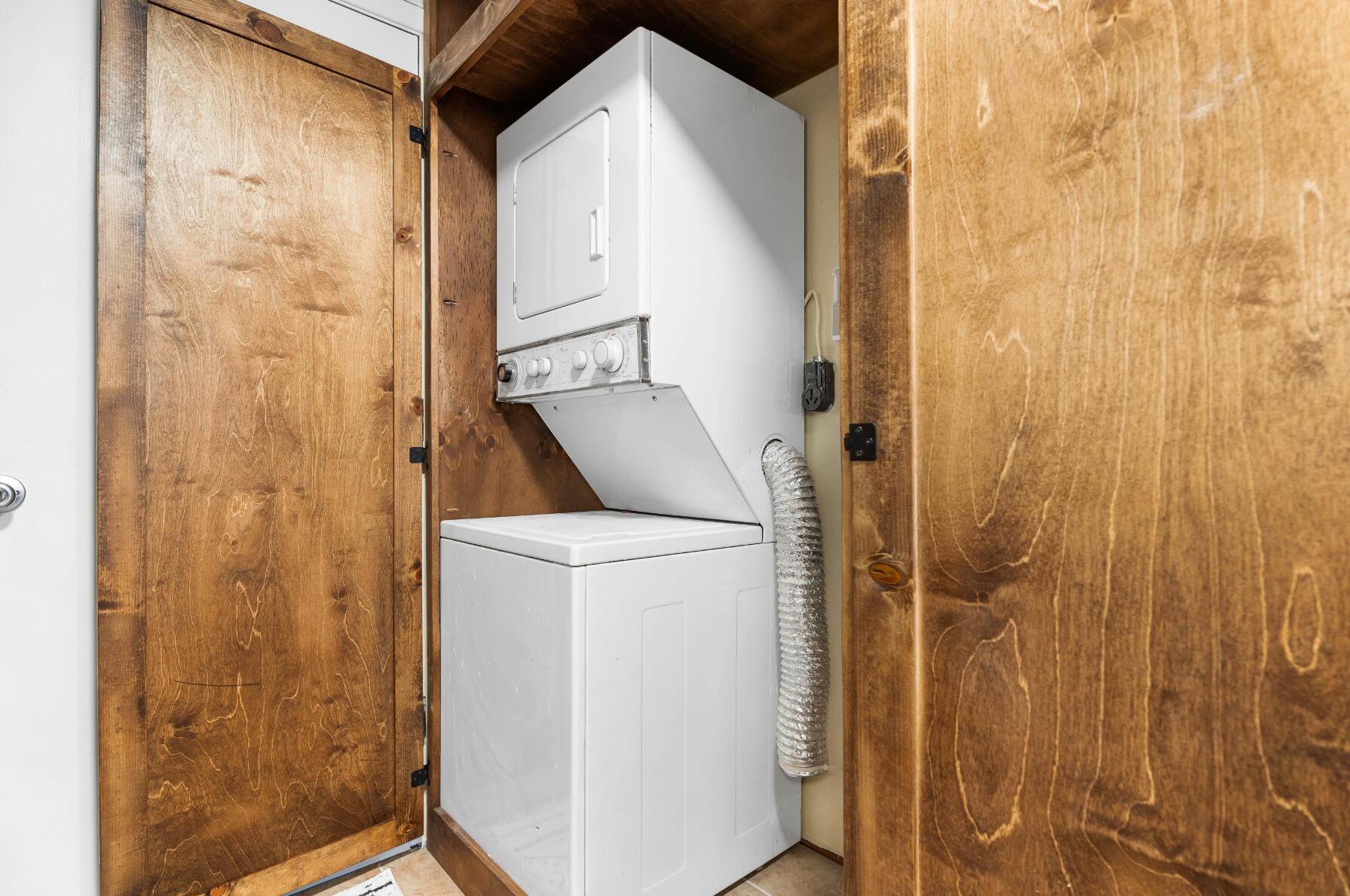 56244 Black Duck Road Bend, OR 97707 - Photo 18 of 24 a utility room with a shower and a door