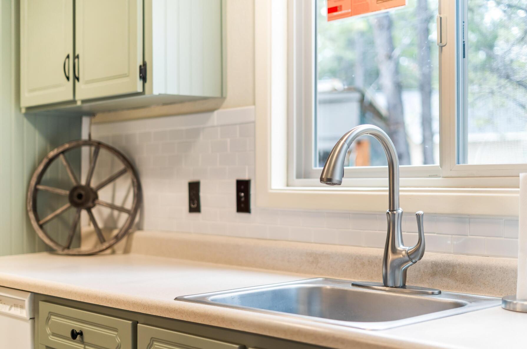 56244 Black Duck Road Bend, OR 97707 - Photo 5 of 24 a kitchen with a sink and a window
