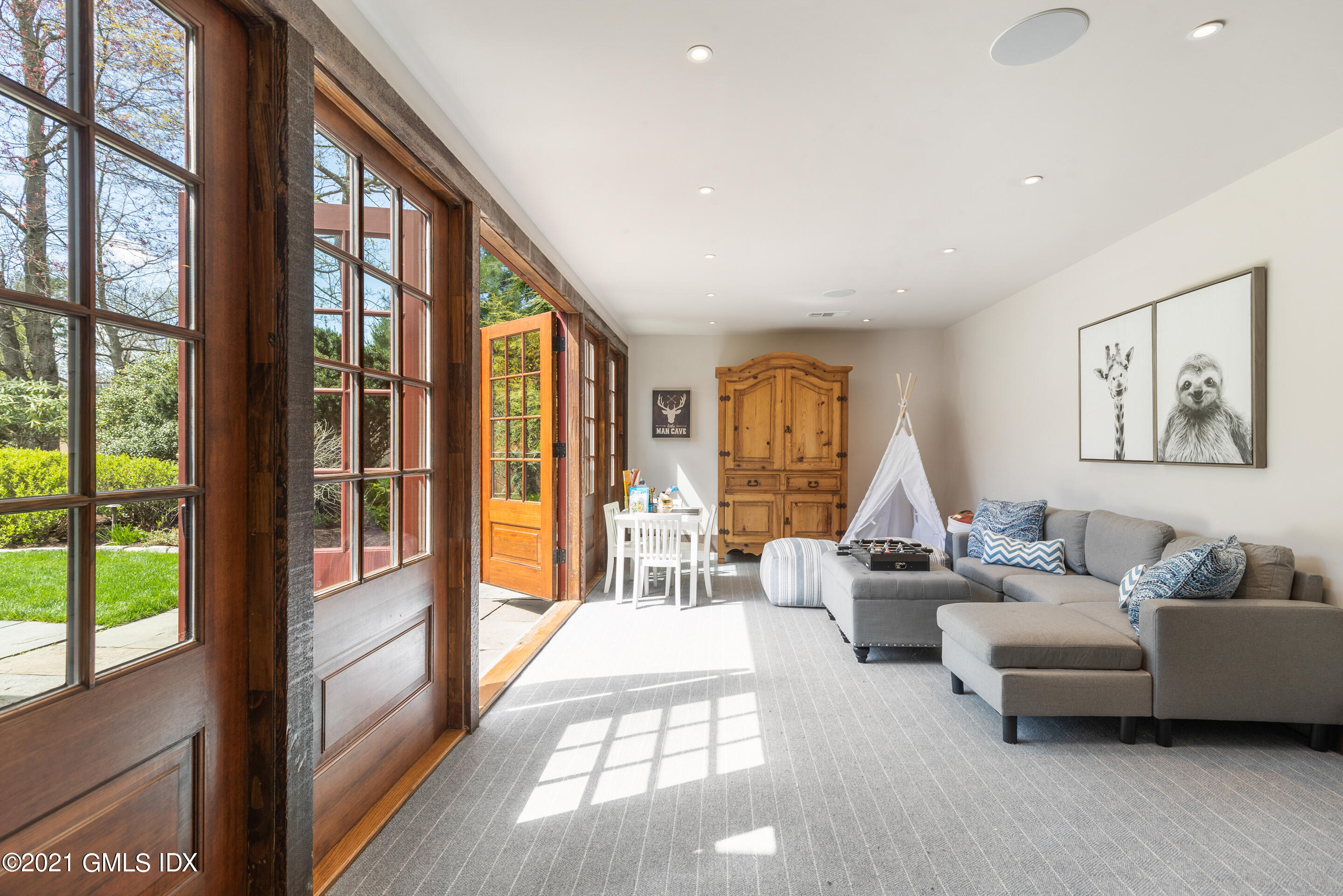 46 Dewart Road Greenwich, CT 06830 - Photo 25 of 39 a living room with furniture and a large window