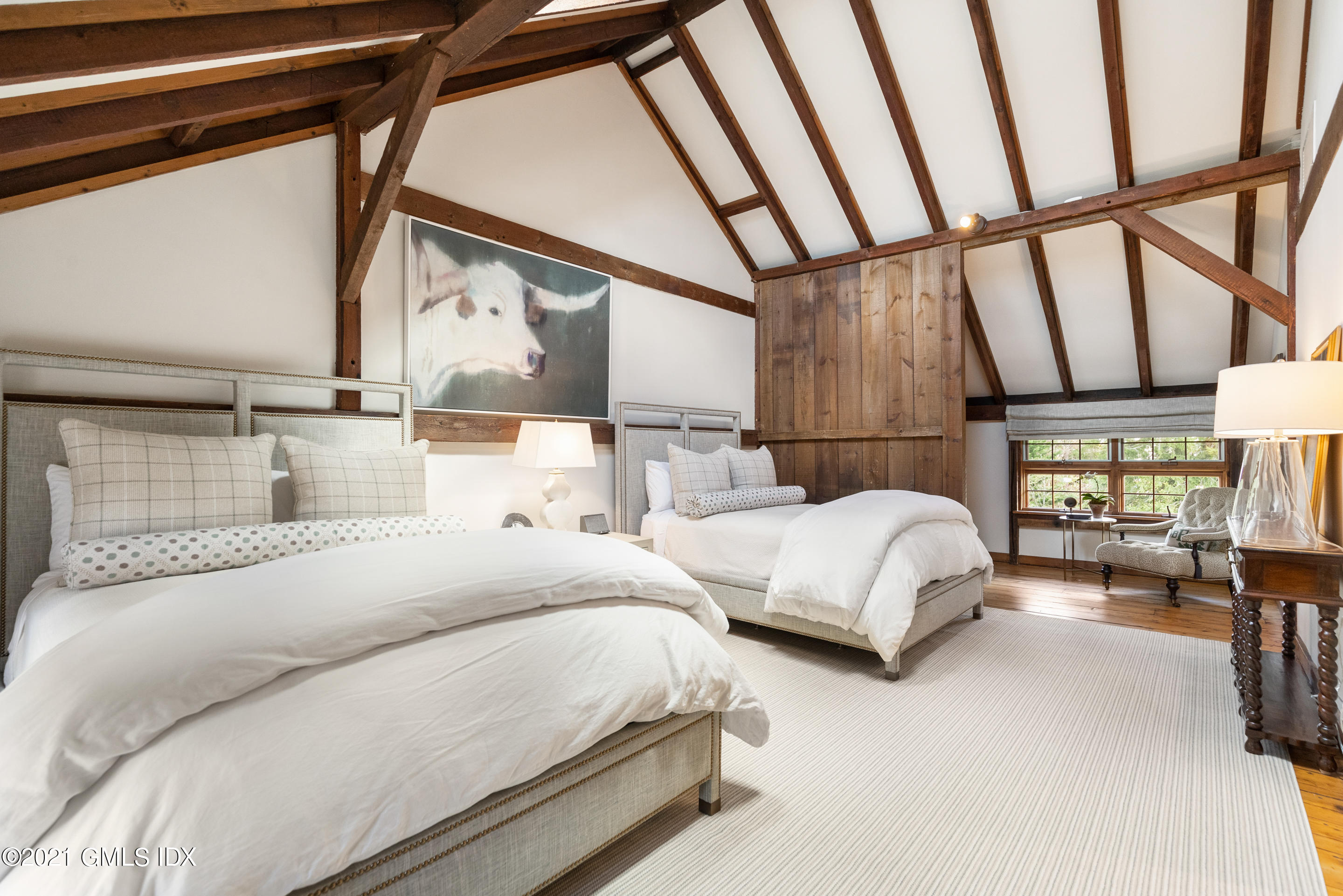 46 Dewart Road Greenwich, CT 06830 - Photo 31 of 39 a bedroom with a bed and a large window