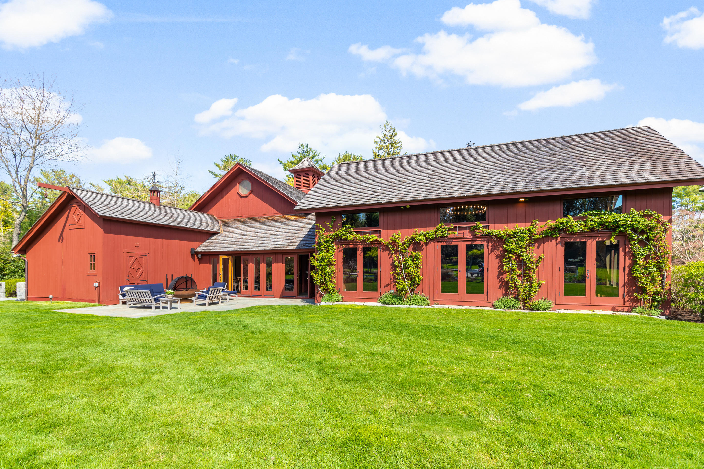 46 Dewart Road Greenwich, CT 06830 - Photo 38 of 39 a front view of house with yard outdoor seating and barbeque oven