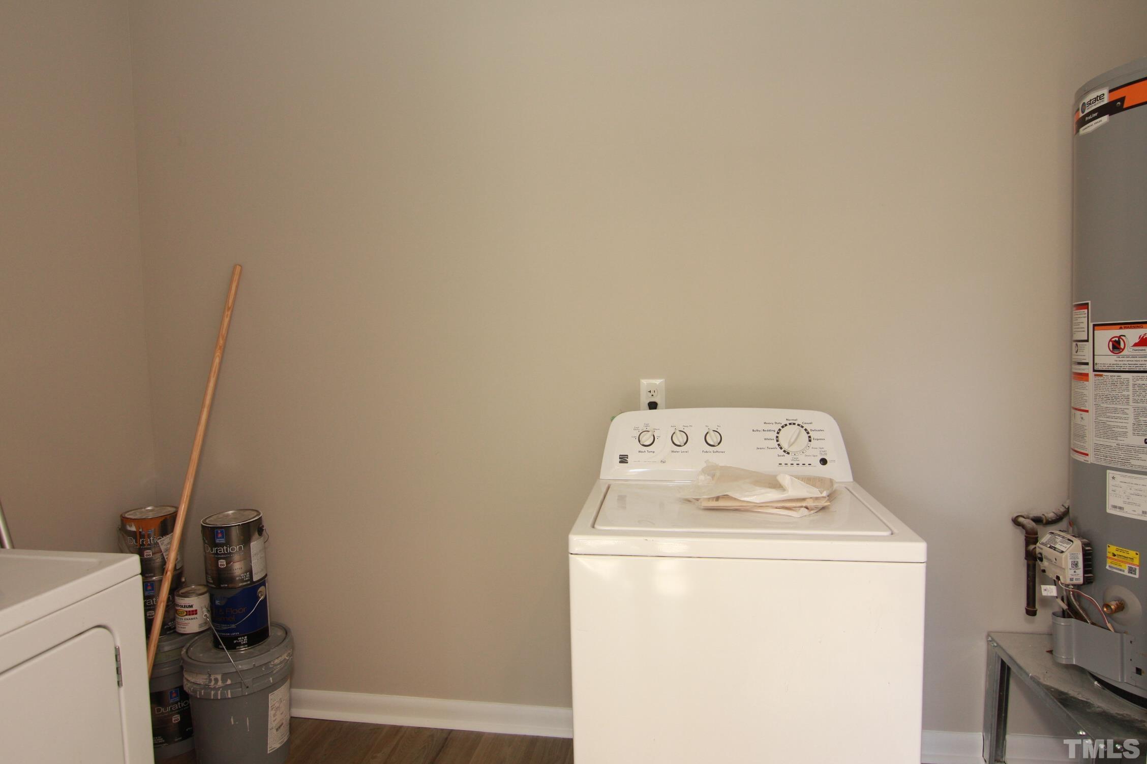 1503 Sedwick Road Durham, NC 27713 - Photo 30 of 33 a utility room with dryer and washer