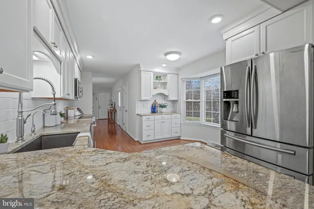 a vase of flowers sitting on a table