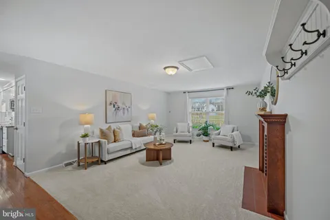 a living room with furniture and a couch