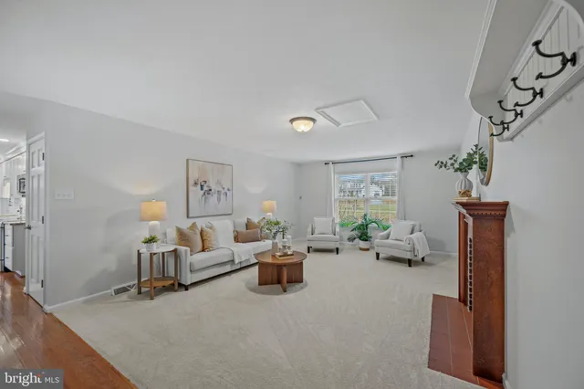 a living room with furniture and a couch