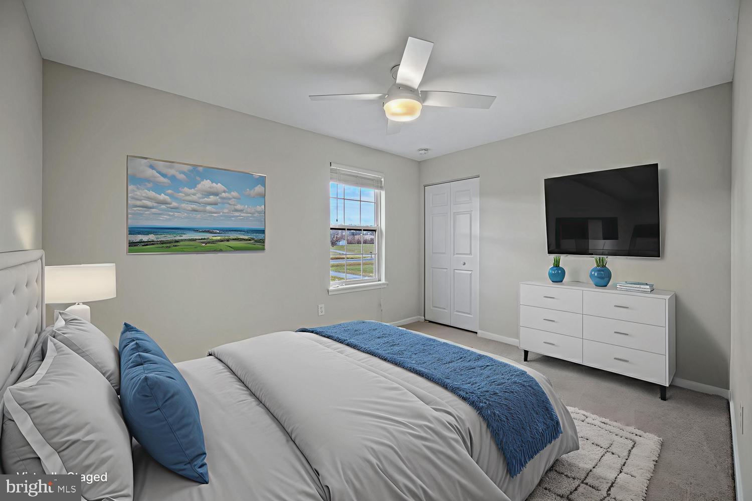 3211 Hayloft Court Woodbine, MD 21797 - Photo 24 of 69 a bedroom with a bed window and a flat screen tv