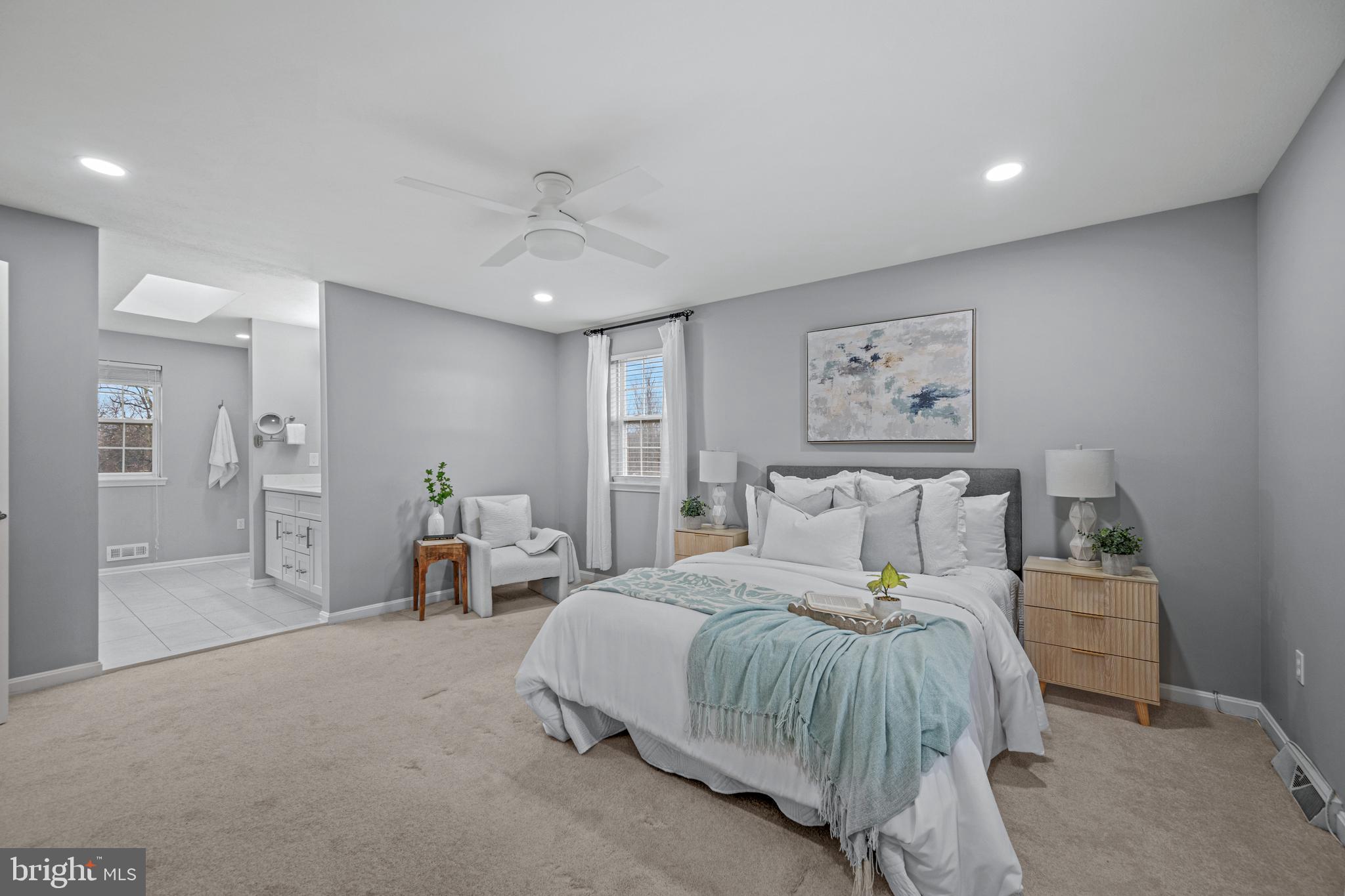 3211 Hayloft Court Woodbine, MD 21797 - Photo 27 of 69 a bedroom with a large bed and paintings on the wall