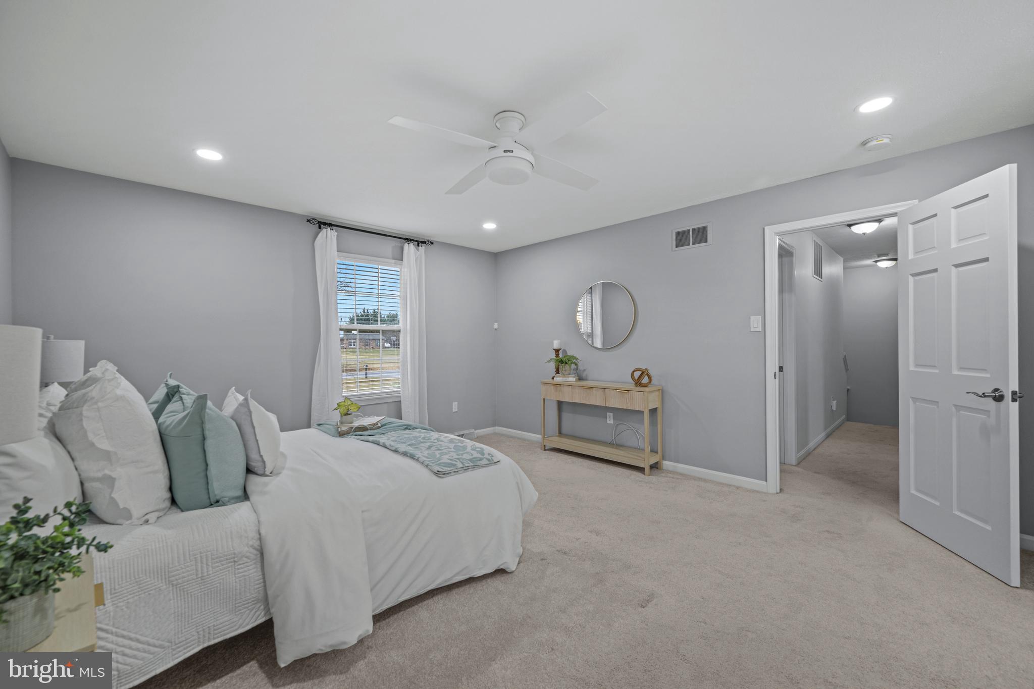 3211 Hayloft Court Woodbine, MD 21797 - Photo 29 of 69 a spacious bedroom with a bed and a cabinets