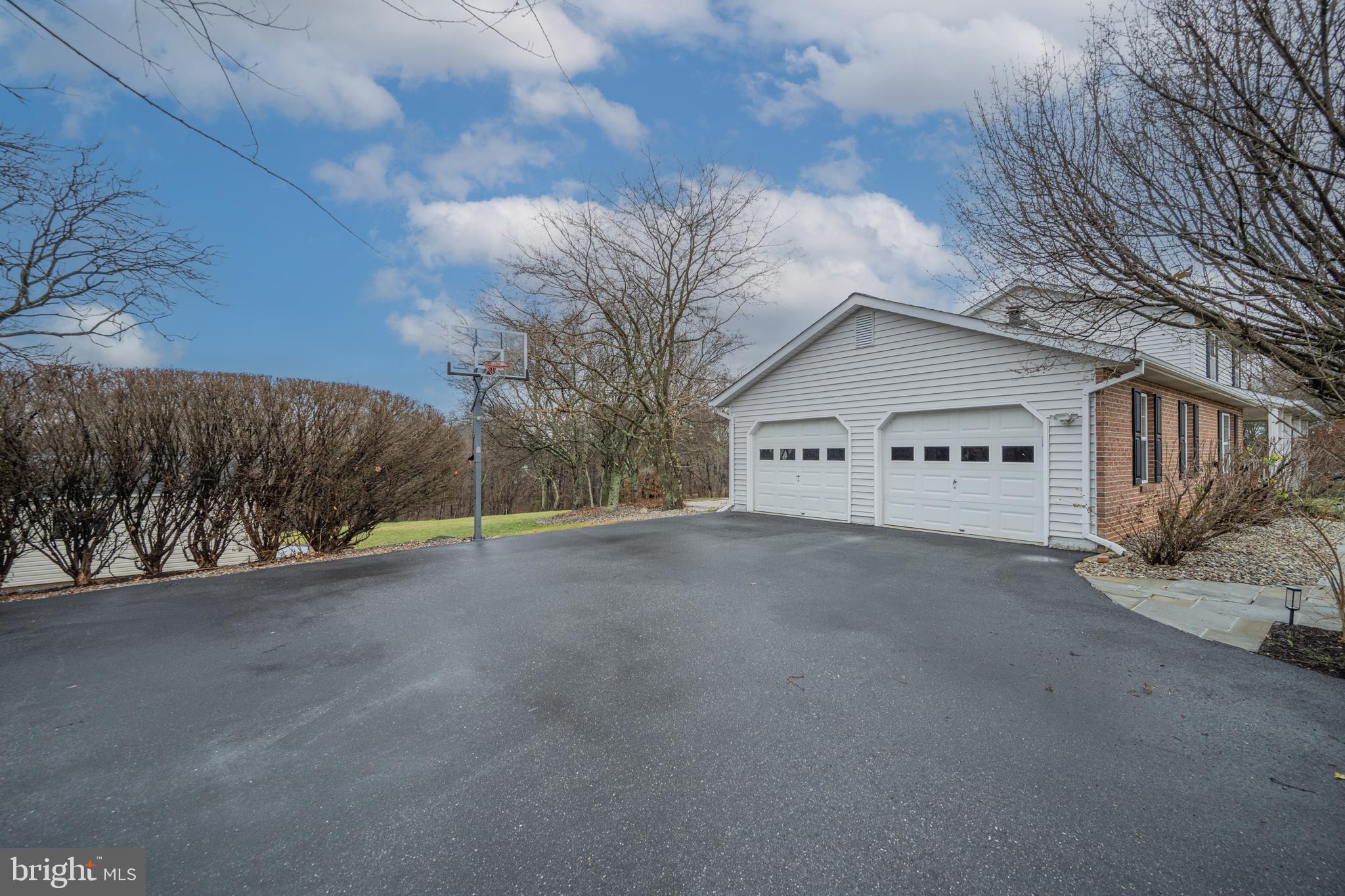 3211 Hayloft Court Woodbine, MD 21797 - Photo 41 of 69 a view of a house with a yard