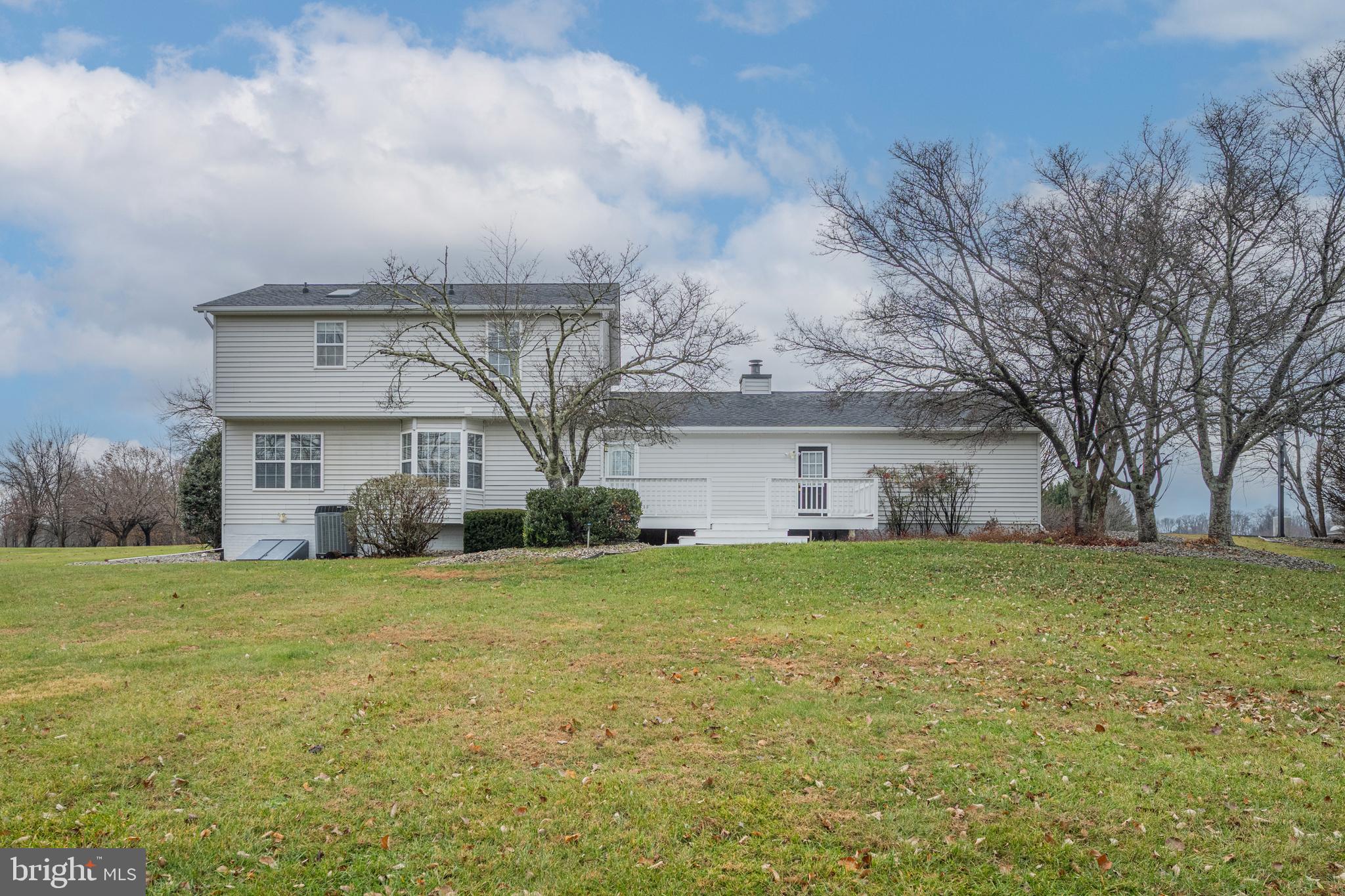 3211 Hayloft Court Woodbine, MD 21797 - Photo 43 of 69 a view of a big house with a big yard and large trees