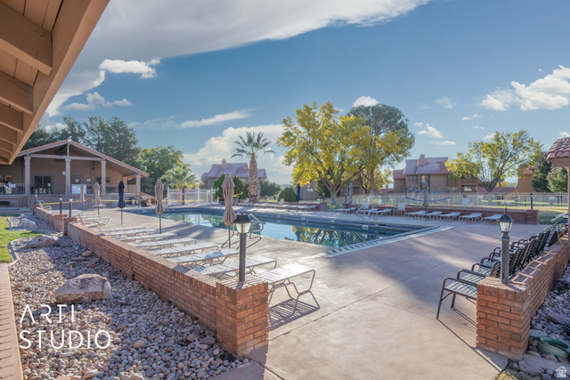 860 South Village Road, Unit A6 St. George, UT 84770 - Photo 29 of 41 Community pool with a patio